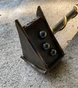 Welded and sculpted pie scepter with leather handle