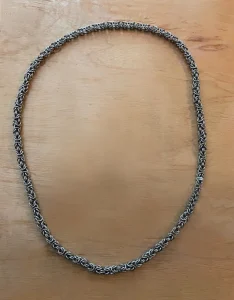 Stainless steel byzantine weave chainmail necklace.