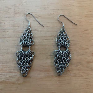Stainless steel chainmail dangle earrings.