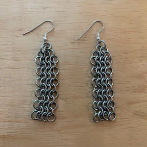 Stainless steel chainmail dangle earrings.